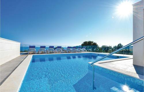 Two-bedroom Apartment With Sea View In Rogoznica