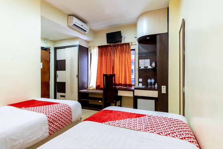 Hostal Capital O 2023 Medan Ville Hotel