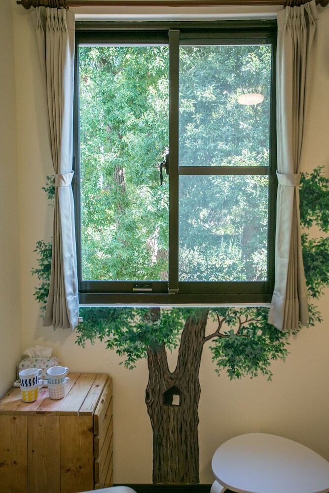 Hotel Tree House Caf� & Homestay