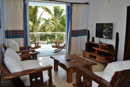 Aparthotel Cowrie Shell Beach Apartments