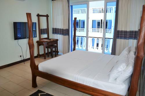 Aparthotel Cowrie Shell Beach Apartments