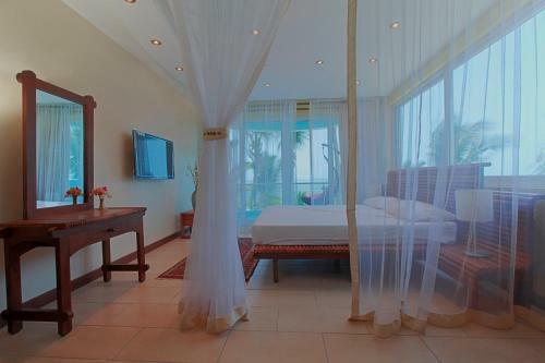 Aparthotel Cowrie Shell Beach Apartments