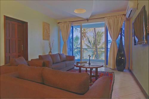 Aparthotel Cowrie Shell Beach Apartments