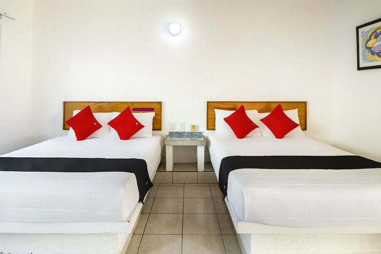 Capital O Hotel Parotas