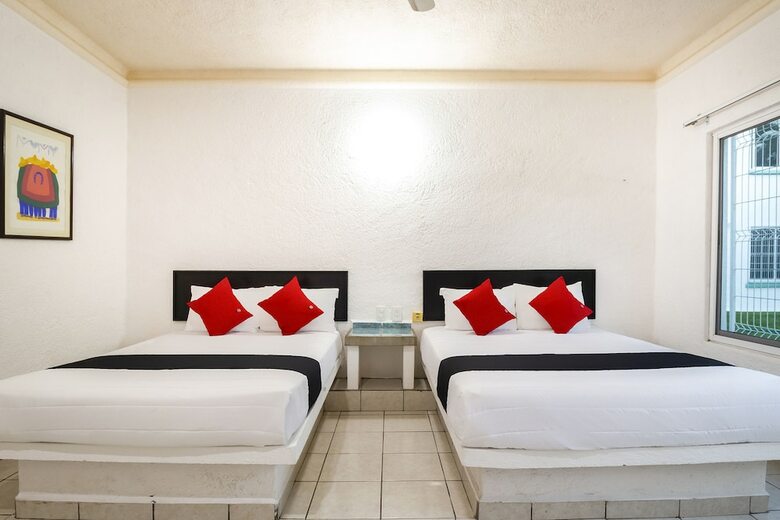 Capital O Hotel Parotas
