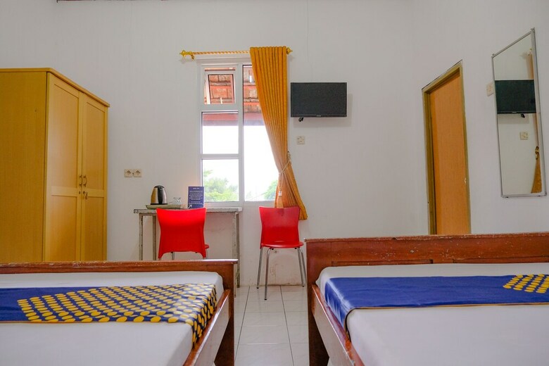 Hostal Spot On 2638 Hotel Raya
