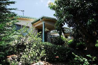 Hotel Camelot Cottages And B&B