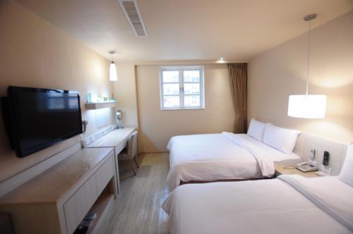 Kindness Hotel - Houyi Jiuru