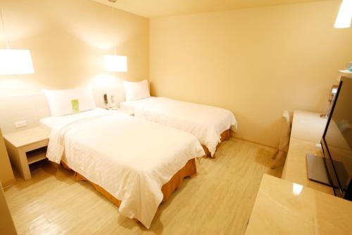 Kindness Hotel - Houyi Jiuru