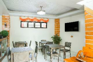 Hotel Oyo 484 Gonzala Suites