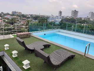 The Greenery Central Suites & Hotel