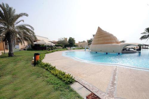 Villa Golden Tulip Al Jazira Bungalows