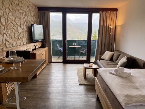 Alpine Studio Apartment By AA Holiday Homes