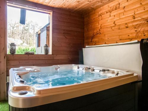 Idyllic Chalet In Biron With 2 Jacuzzis And Sauna