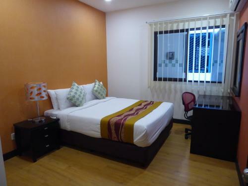 Apartamentos Rimbun Suites & Residences