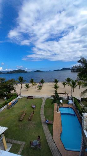 Casa Com 6 Quartos A Beira Mar Em Condom�nio Em Angra Dos Reis.