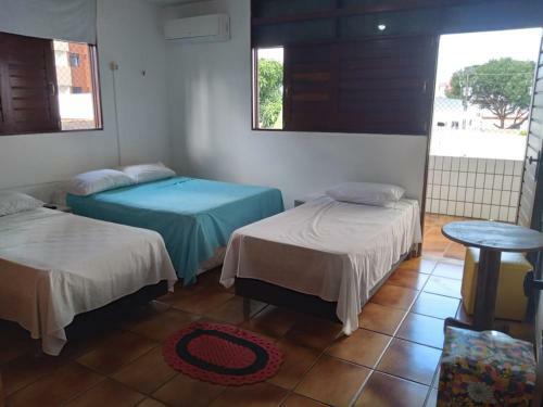 Hostal Regiane Beach Pousada Hostel