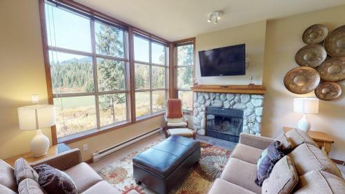 Tranquil Chateau Golf Course Setting By Harmony Whistler