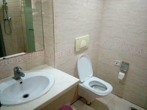 Apartamento Xinjinshan Yijia Condo Hotel