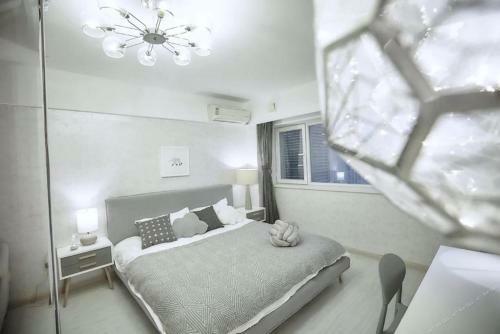 Apartamento Xinjinshan Yijia Condo Hotel