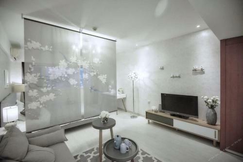 Apartamento Xinjinshan Yijia Condo Hotel