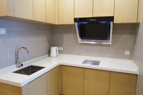 Hotel Donghua Apartment
