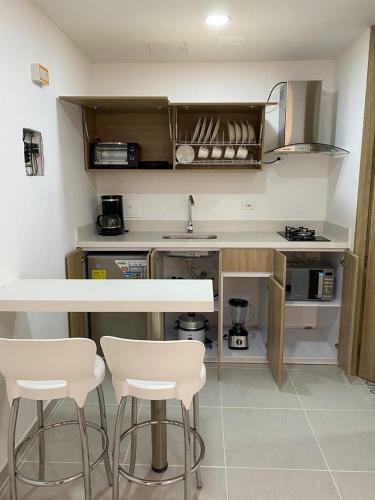 A&a Apartahoteles Malec�n
