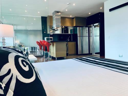 Apartamento Modern Studio - Pool, Gym - Near Everything.
