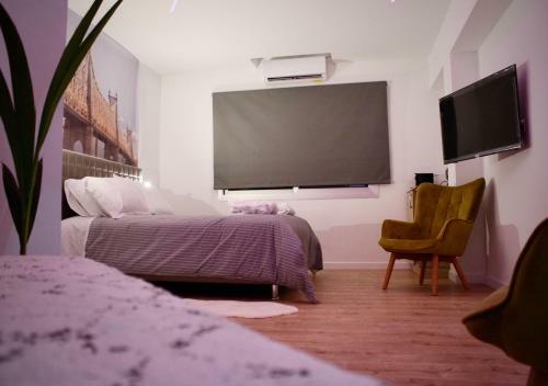 Apartamento Purple Orange Luxury Suites