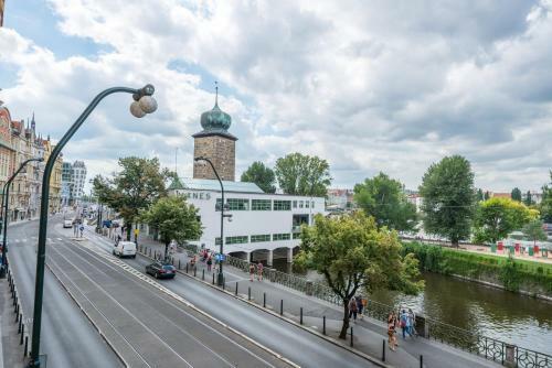 Riverside Apartment With A Balcony