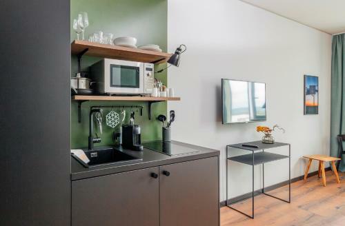 Black F Serviced Apartments