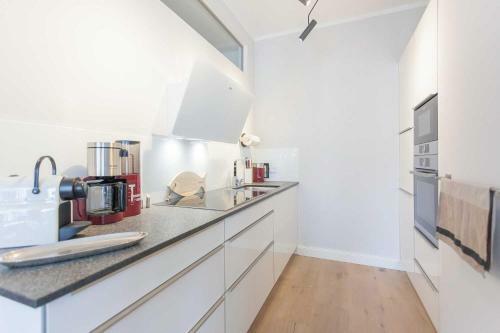 Apartamento First White Pearl