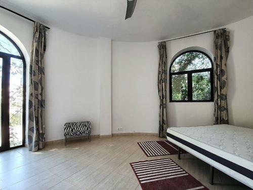 Alluring Holiday Home In Benalm�dena With Swimming Pool