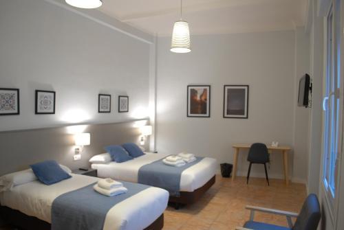 Pension La Perla Granada Suites
