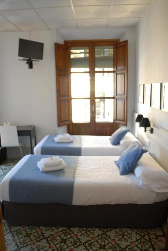 Pension La Perla Granada Suites