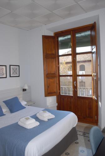 Pension La Perla Granada Suites