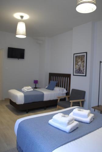 Pension La Perla Granada Suites