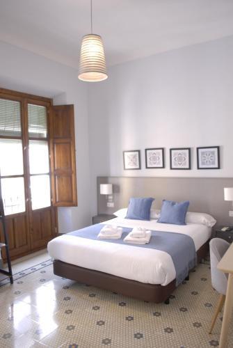 Pension La Perla Granada Suites