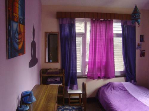 Hostal Buddha Rooms