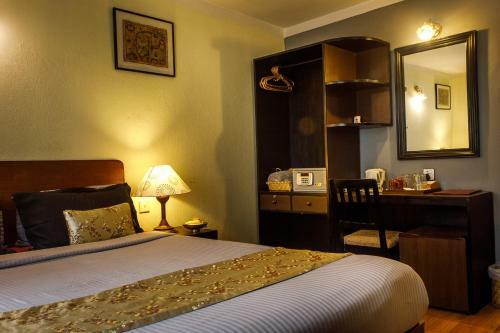 Hotel Ambassador Garden Home