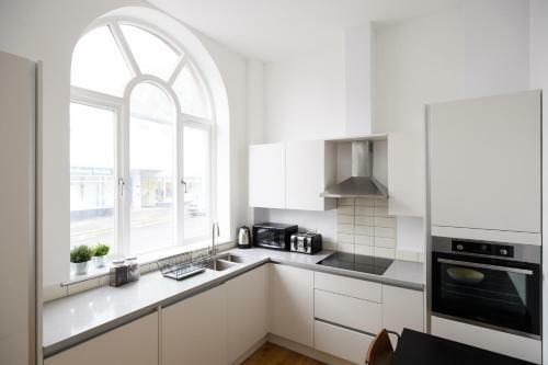 Primero Apartments - Old Post Office Apartments