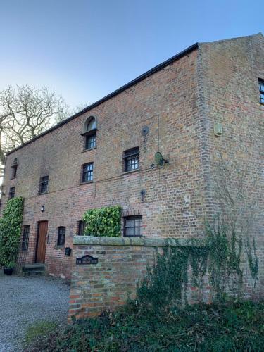 Apartamento The Carriage House. Sleeps 18+. York.