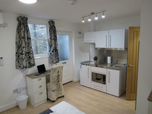 Hostal The Tas Suites - Tas Accommodations
