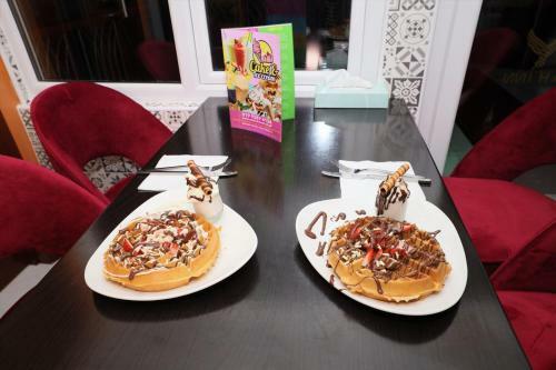 Hotel Atz&h Inn