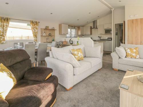 Stylish Lodge Set In The Sand Le Mere Holiday Park