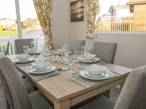 Stylish Lodge Set In The Sand Le Mere Holiday Park