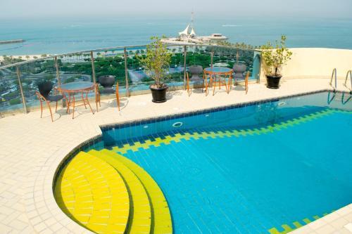 Corniche Suites Hotel