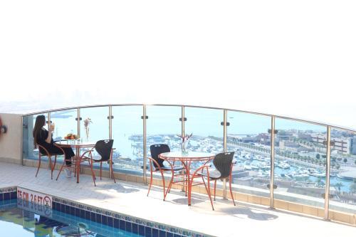 Corniche Suites Hotel