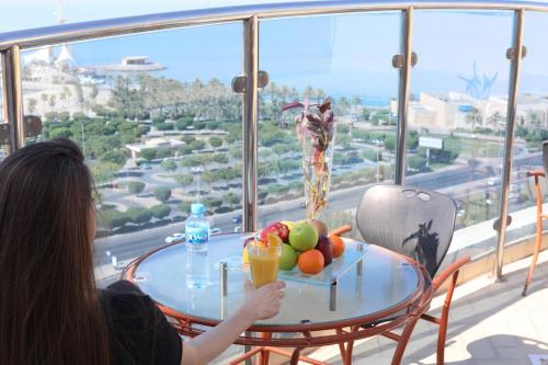 Corniche Suites Hotel