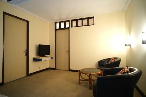 Capital O 1963 Hotel The New Benakutai
